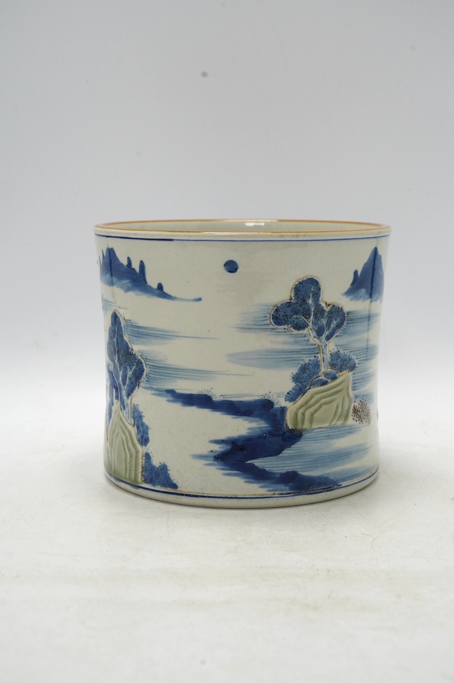 A large Chinese underglaze blue and copper red brush pot, 17cm high. Condition - good